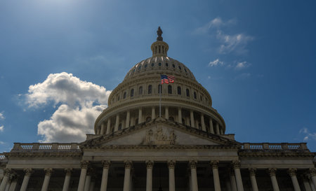 Washington DC Capitol building. Congress on Capitol Hill. American flag over Capitol. United States...