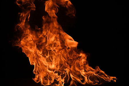 Fire blaze flames on black background. Fire burn flame isolated, abstract texture. Flaming explosion...