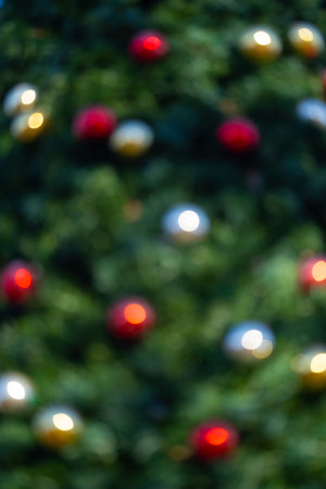Decorations Christmas tree. Colorful baubles with festive bokeh. Christmas background. Winter...