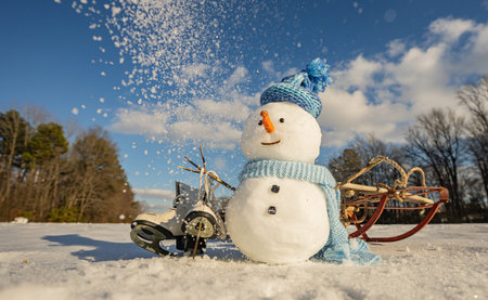 Snowman with carrot nose. Winter holiday snowman. Snow man for winter background. Cute snowman....