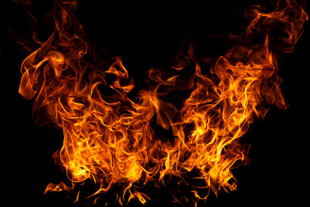 Blazing fire delivering energetic heat and motion. Flame pattern with bright fiery curves. Intense...