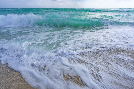 Ocean wave motion on sea shore. Summer sea breeze. Sea nature backdrop. Peaceful ocean. Dreamy ocean horizon. Coastal ocean paradise wallpaper. Seafoam waves.の写真素材