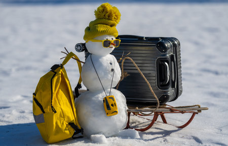 Snowman on festive greeting card for Christmas. Cute snowman on winter holiday card. Greeting card with snowman in snow. Merry Christmas card. Snowman design on New Year celebration design.の写真素材