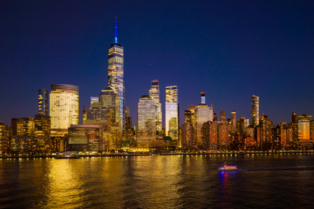 Manhattan at night. New York City panoramic skyline. NYC aerial cityscape. New York City downtown at...