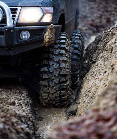 04. 30. 2025, Carpathians. Off-road SUV drives through mountains. Off-road adventure in the dirt....