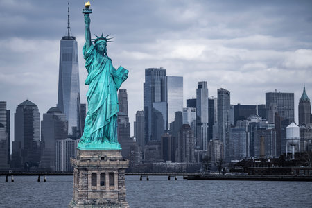 New York City cityscape on Liberty Statue. NYC downtown towers and Liberty Statue.