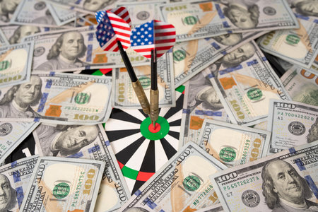 Money and goal concept with dart hitting target. Financial success with dollars and banknotes....