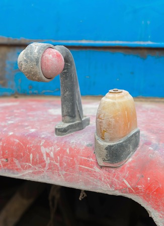 Vintage rusty red truck car with a old headlight, soft focusの写真素材