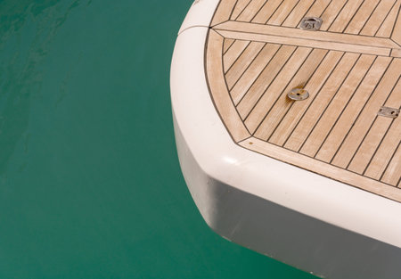 wooden deck of a yacht on sea background