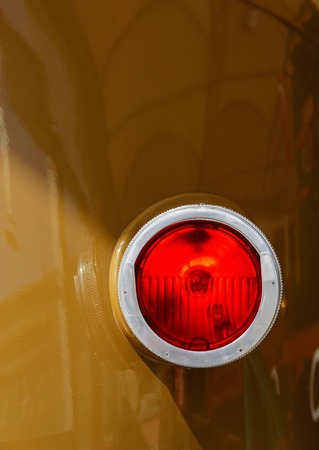 Big locomotive reflector with light bulb on the sidewall. Brown body.の写真素材
