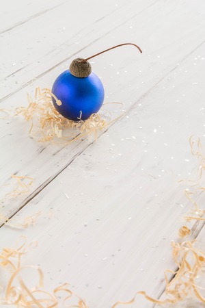 bright toys for Christmas tree and interior design, on white wooden background. Vertical comhosition,の写真素材