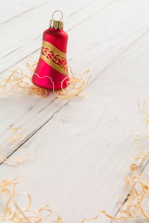 bright toys for Christmas tree and interior design, on white wooden background. Vertical comhosition,の写真素材