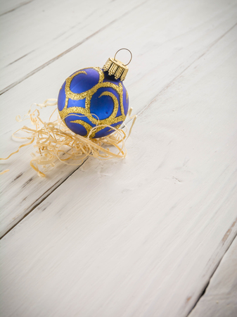 bright toys for Christmas tree and interior design, on white wooden background. Vertical comhosition,の写真素材