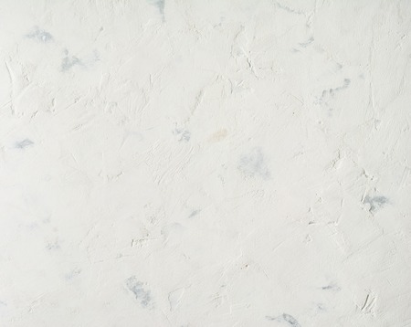 white background, lime plaster wall with scratches and irregularities. Space for text.の写真素材