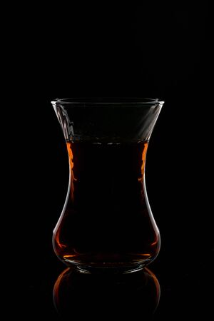 Cup of tea black backgroundの写真素材