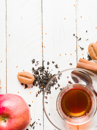 Morning tea with fruit and candied fruit. White wooden background and place for text.の写真素材