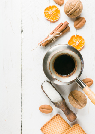Morning tea with fruit and candied fruit. White wooden background and place for text.の写真素材