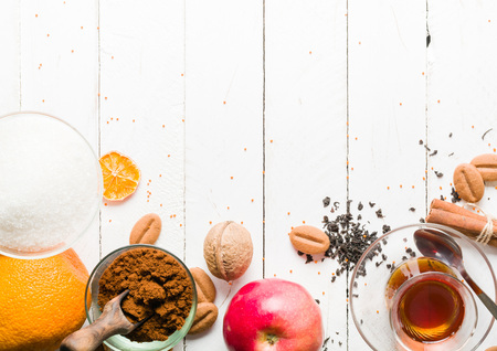Morning tea with fruit and candied fruit. White wooden background and place for text.の写真素材