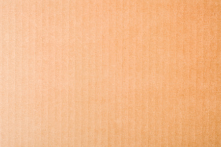 Texture or background of corrugated cardboard. Light brown backdropの写真素材