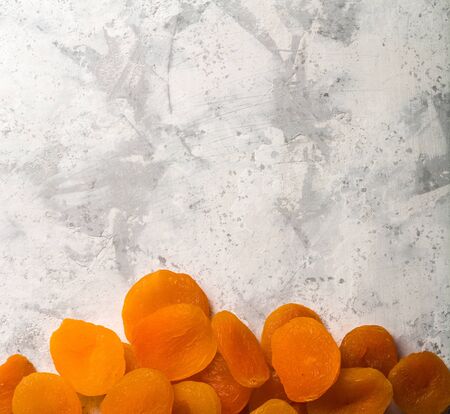 Delicious and healthy dried apricots. Freshly dried. On a white backgroundの写真素材