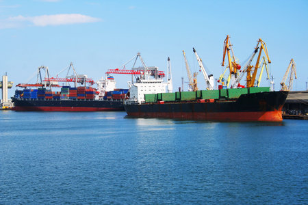 Shipping cargo onto barges in Odessa port. 