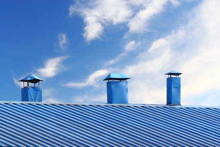 Kitchen chimney smoke and roof の写真素材