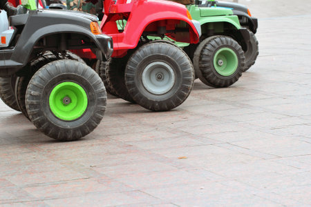 Tiny children's cars for entertainment in the parkの写真素材