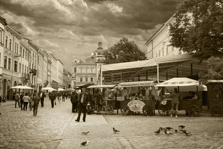 LVIV, UKRAINE - MAY 8, 2016:  A place called "Market Square" in the center of Lviv, Ukraine. This is the most visited part of the city where everyone can have fun and buy something tasty.のeditorial素材