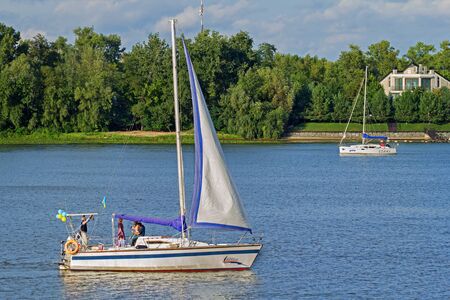 Kiev, Ukraine - 24 August, 2016: People having a good time sailing on yachts in Dnieper river in Kiev, Ukraineのeditorial素材