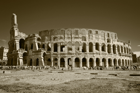 Colosseum surrounded by crouds of people in sunny day Rome, Italyのeditorial素材