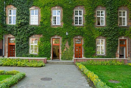 Krakow, Poland - 2 September, 2016: Overgrown green building at the Wawel castle
