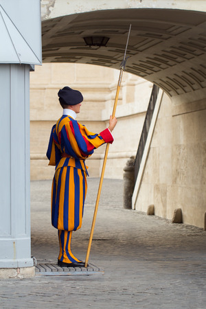 Vatican, Italy - 5 September, 2016: Swiss guard performing his duties at Papal Basilica of St. Peter in the Vatican, Italy.のeditorial素材