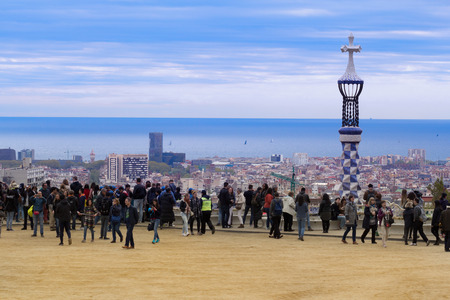 Barcelona, Spain - 1 April, 2017: Beautiful cloudy view of crowded Park Guell.のeditorial素材