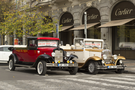 Prague, Czech Republic - 26 October, 2017: Old retro cars on the street of Prague waiting for someone who would rent it.のeditorial素材