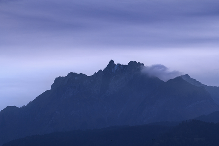 Alpine mountain peak view from the Lucerne city, Switzerlandの写真素材