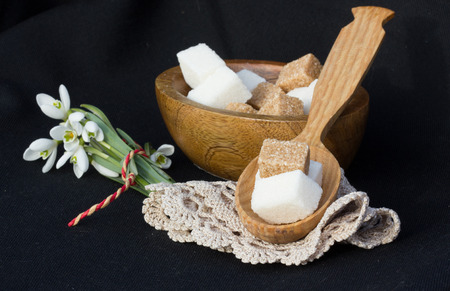 lump sugar on a spoonの写真素材