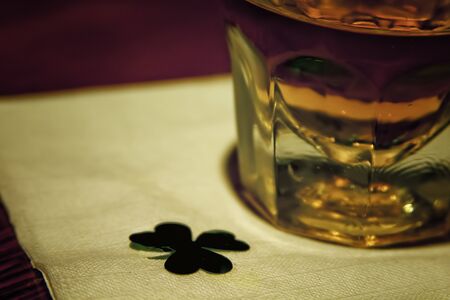 Whiskey Drink on Napkin with Shamrockの写真素材