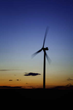 Wind Turbine Renewable Energy at Sunset Portraitの写真素材