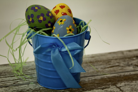 Easter Eggs in a Blue Bucket