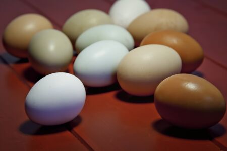 Farm Fresh Eggs on Red Woodの写真素材