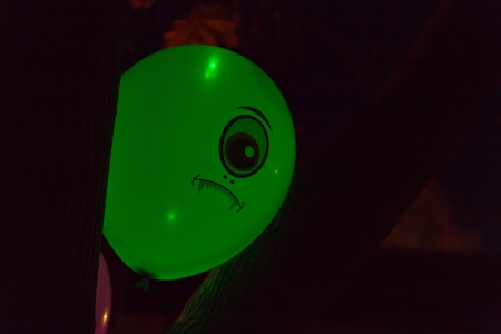 Glow in the dark green alien with one eyeの写真素材