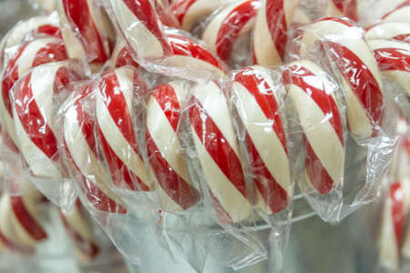 Large striped red and white holiday candy canesの写真素材