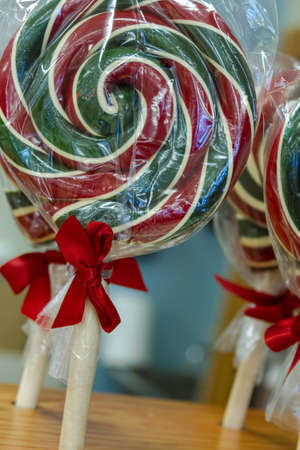 Red and green packaged lollipopsの写真素材