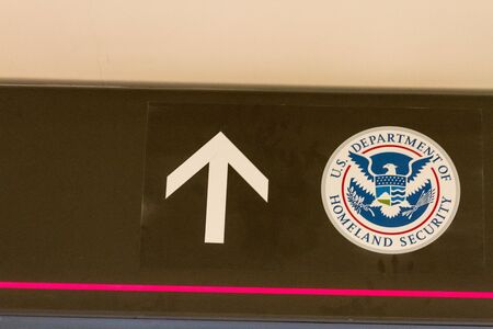 US Department of Homeland Security sign in airportのeditorial素材