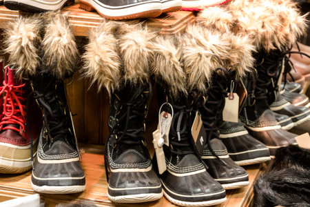 Display of winter snow boots in various colorsの写真素材