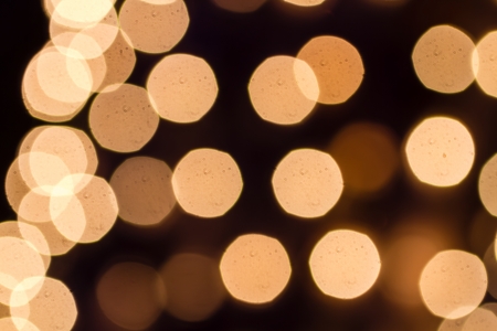 Abstract circular bokeh background of white Christmas lightsの写真素材