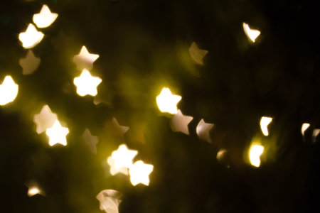 Abstract heart shaped bokeh of white Christmas lights