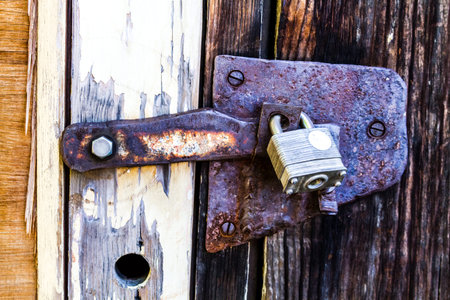 Weathered wooden texture door with lock