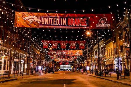 DENVER COLORADO / USA - January 10, 2015: Special light and sign display of NFL Team Denver Broncos United in Orange campaign for 2015 NFL Playoffs January 10, 2015 in Denver, Coloradoのeditorial素材