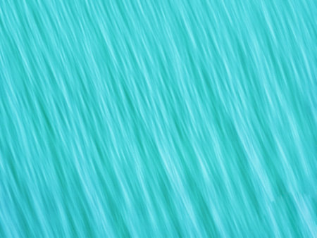 Bright turquoise blue blurred diagonal lines abstract background artwork for creative graphic design...